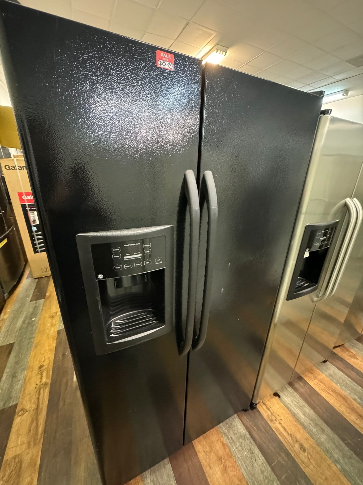 GE Refurbished Black 25.0 Cu. Ft. Side-By-Side Refrigerator with Dispenser