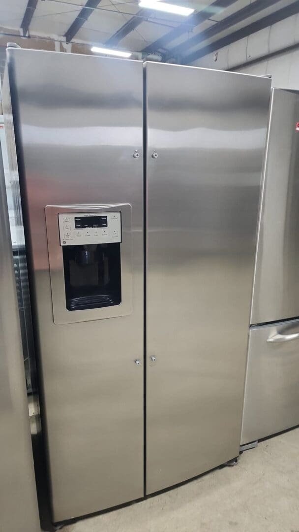 GE Used Side By Side Refrigerator – Stainless