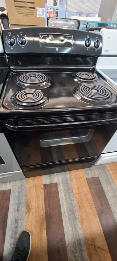 GE Used 4 Coil Top Stove Freestanding – Black
