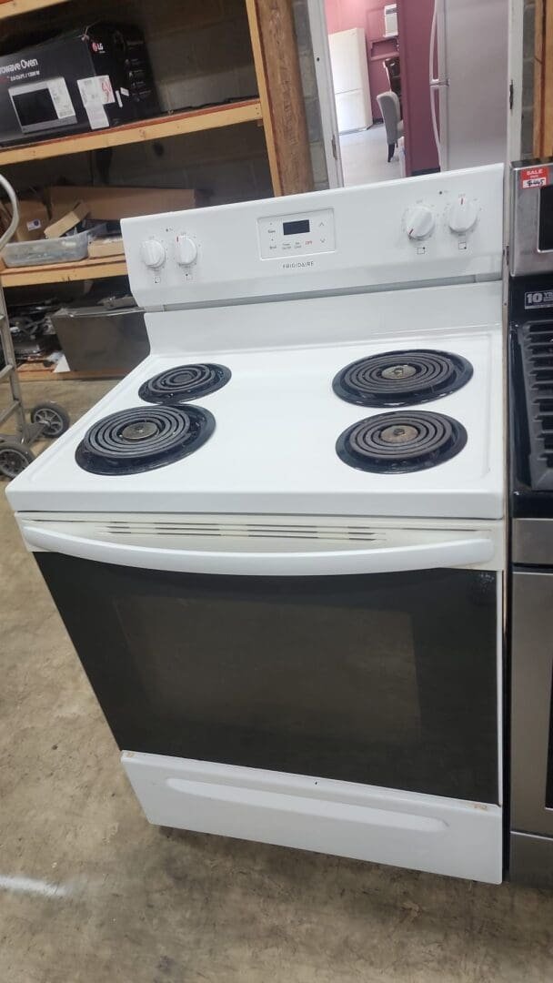 Frigidaire Used 4 Coil Top Stove Freestanding – White & Black